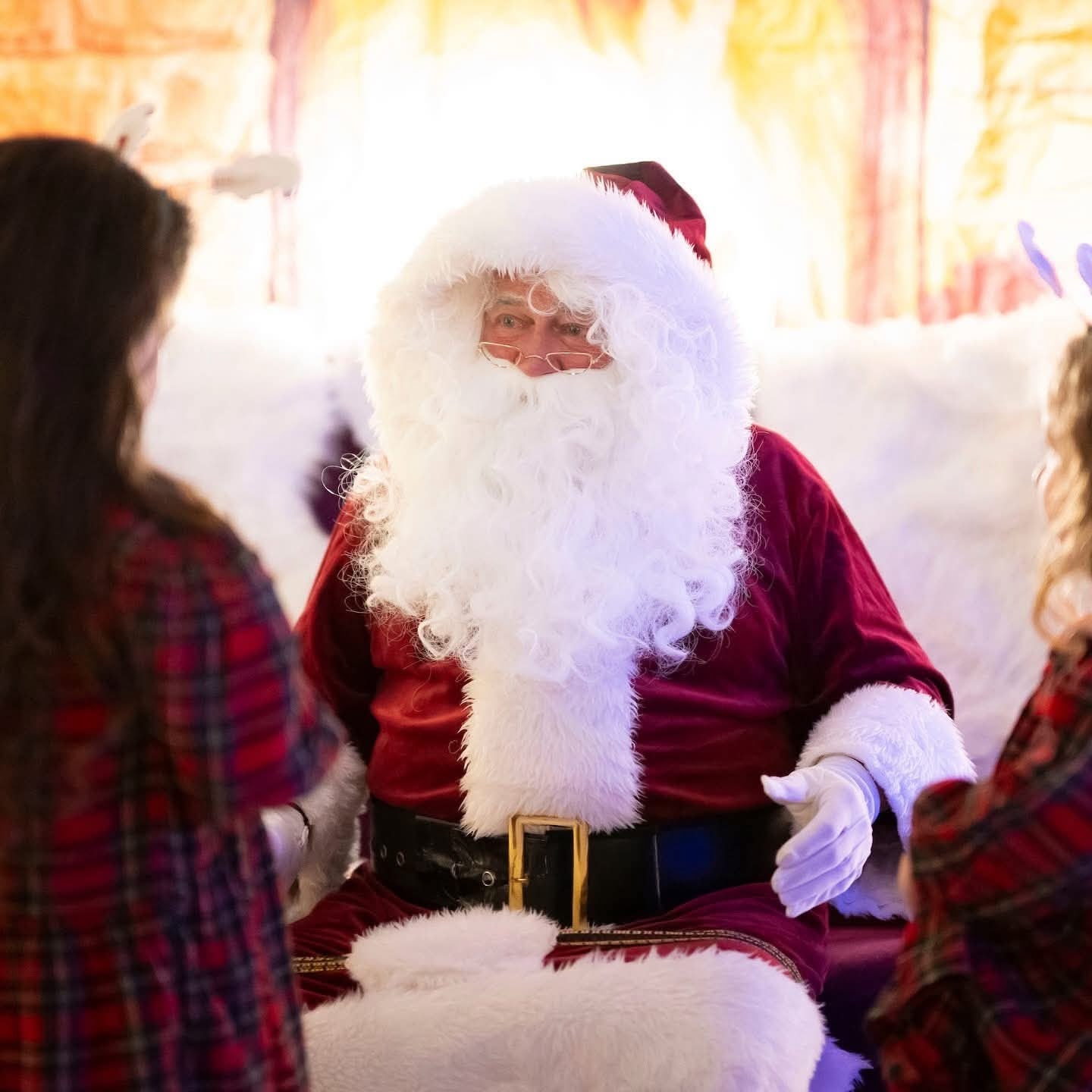 Santa sharing a moment with children